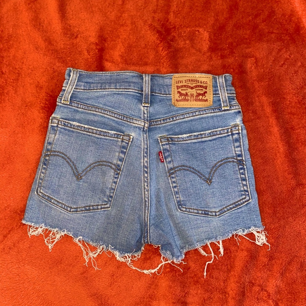 Levi’s high rise, light wash women shorts.
